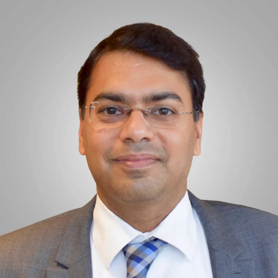 Dr. Tushar Poddar